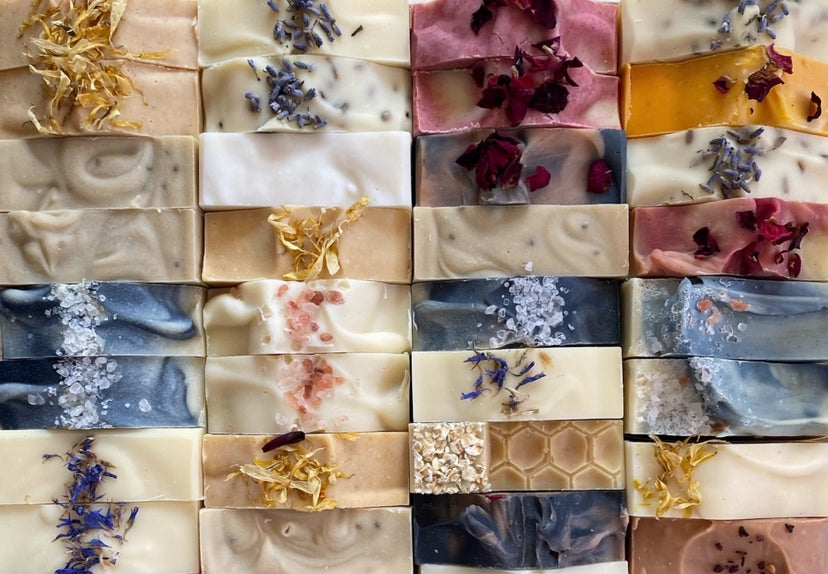 Collage of various soap bars with natural ingredients